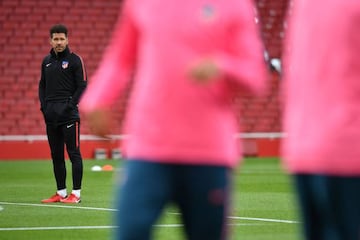 Simeone watches as Atlético train on Wednesday evening.