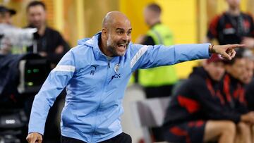 Manchester City's Spanish manager Pep Guardiola gestures during the international friendly match between Manchester City and FC Bayern Munich at at Lambeau Field in Green Bay, Wisconsin, on July 23, 2022. (Photo by Kamil KRZACZYNSKI / AFP)