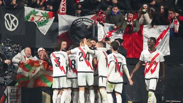 Rayo Vallecano players celebrate after Rayo Vallecano's Spanish forward #07 Isi Palazon scored their third goal during the Spanish league football match between Rayo Vallecano de Madrid and Real Madrid CF at the Vallecas stadium in Madrid on December 14, 2024. (Photo by Pierre-Philippe MARCOU / AFP)
