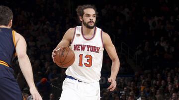 Joakim Noah of the New York Knicks handles the ball against the Cleveland Cavaliers