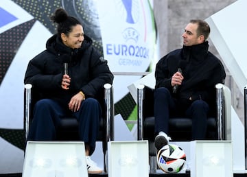 Soccer Football - Euro 2024 - Organisers Present the Official Match Ball - Maifeld, Berlin, Germany - November 15, 2023 Former footballers Celia Sasic and Philipp Lahm with the Euro 2024 match ball 'Fussballliebe' during the presentation REUTERS/Annegret Hilse