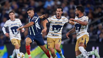 German Berterame (L) of Monterrey fights for the ball with Pablo Bennevendo (R) of Pumas during the Quarter final first leg round match between Monterrey and Pumas UNAM as part of the Liga BBVA MX, Torneo Apertura 2024 at BBVA Bancomer Stadium on November 28, 2024 in Monterrey, Nuevo Leon, Mexico.