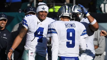 Jan 1, 2017; Philadelphia, PA, USA; Dallas Cowboys quarterback Dak Prescott (4) congratulates quarterback Tony Romo (9) after Romo&#039;s touchdown pas in the second quarter against the Philadelphia Eagles at Lincoln Financial Field. Mandatory Credit: James Lang-USA TODAY Sports