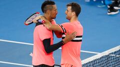 MELBOURNE, AUSTRALIA - JANUARY 21:  Nick Kyrgios of Australia and Grigor Dimitrov of Bulgaria embrace after their fourth round match on day seven of the 2018 Australian Open at Melbourne Park on January 21, 2018 in Melbourne, Australia.  (Photo by Darrian
