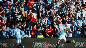 Aspas y Larsen celebran el gol del noruego contra el Granada.