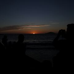 Why do colours look different during a solar eclipse?