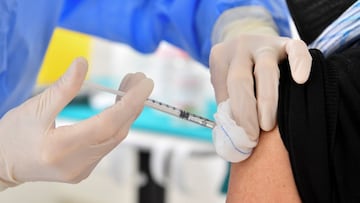 A medical worker administers the Russian Sputnik V coronavirus disease (COVID-19) vaccine in the Republic of San Marino, March 29, 2021. REUTERS/Jennifer Lorenzini