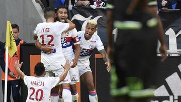 Lyon's French midfielder Nabil Fekir (2ndL) celebrates after scoring a goal during the French L1 football match Lyon (OL) vs Guingamp (EAG), on September 10, 2017 at the Groupama stadium in DxE9cines-Charpieu near Lyon, southeastern France. / AFP PHOTO / JEAN-PHILIPPE KSIAZEK