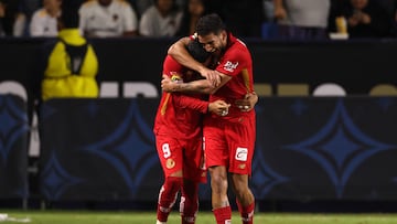 Oct 1, 2025; Carson, California, USA; Toluca defender Federico Pereira (right) celebrates with forward Alexis Vega (9) after scoring a goal during the second half of Campeones Cup between Toluca and the LA Galaxy at Dignity Health Sports Park. Mandatory Credit: Kiyoshi Mio-Imagn Images