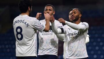 Manchester City&#039;s English midfielder Raheem Sterling (R) celebrates scoring his team&#039;s second goal with Manchester City&#039;s Brazilian striker Gabriel Jesus (C) during the English Premier League football match between Burnley and Manchester Ci