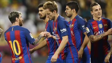 FC Barcelona's Luis Suarez (2nd R), Lucas Digne (R), Linonal Messi (L), Ivan Rakitic (3rd L) and AndrxE9 Gomes (2nd L) celebrate after a goal during a friendly football match between FC Barcelona and Saudi Arabia's Al-Ahli FC on December 13, 2016 in the Qatari capital Doha.
Barcelona play Saudi champions Al-Ahli in a friendly in Doha, the Spanish club's last major obligation of its four year shirt sponsorship deal with Qatar Airways.
/ AFP PHOTO / KARIM JAAFAR