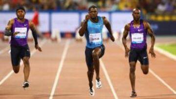 El estadounidense Justin Gatlin (centro) se impone a su compatriota Michael Rodgers y a Kim Collins, de St. Kitts &amp; Nevis. 