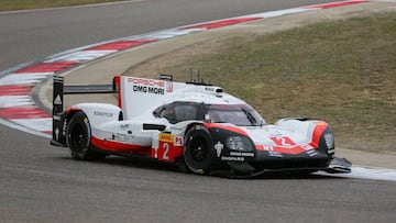 A race car of the Porsche LMP team, Porsche 919 Hybrid Number 2, takes part in the FIA World Endurance Championship race in Shanghai on November 5, 2017. / AFP PHOTO / STR / China OUT