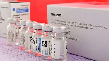 (FILES) In this file photo taken on March 25, 2021 bottles of the single-dose Johnson &amp; Johnson Janssen Covid-19 vaccine await transfer into syringes for administration at a vaccine rollout targetting immigrants and the undocumented organized by the S