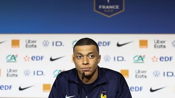 France's forward Kylian Mbappe looks on during a press conference at the Groupama Stadium in Decines-Charpieu, near Lyon, on March 22, 2024, on the eve of the friendly football match between France and Germany. (Photo by FRANCK FIFE / AFP)