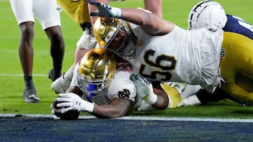 MIAMI GARDENS, FLORIDA - JANUARY 09: Jeremiyah Love #4 of the Notre Dame Fighting Irish runs the ball for a touchdown during the fourth quarter against the Penn State Nittany Lions in the Capital One Orange Bowl at Hard Rock Stadium on January 09, 2025 in Miami Gardens, Florida. Rich Storry/Getty Images/AFP (Photo by Rich Storry / GETTY IMAGES NORTH AMERICA / Getty Images via AFP)