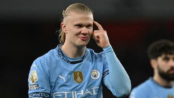 Manchester City's Norwegian striker #09 Erling Haaland gestures on the pitch after the English Premier League football match between Arsenal and Manchester City at the Emirates Stadium in London on February 2, 2025. Arsenal won the game 5-1. (Photo by Glyn KIRK / AFP) / RESTRICTED TO EDITORIAL USE. No use with unauthorized audio, video, data, fixture lists, club/league logos or 'live' services. Online in-match use limited to 120 images. An additional 40 images may be used in extra time. No video emulation. Social media in-match use limited to 120 images. An additional 40 images may be used in extra time. No use in betting publications, games or single club/league/player publications. /