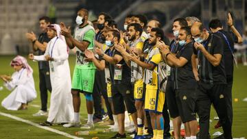 Nassr&#039;s players react to the penalty shoot-out during the AFC Champions League semi-finals match between Saudi&#039;s Al-Nassr and Iran&#039;s Persepolis on October 3, 2020, at the Jassim Bin Hamad Stadium in the Qatari capital Doha. (Photo by Mustaf