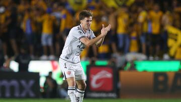 Necaxa's midfielder #08 Agustin Palavecino celebrates after scoring his team's first goal during the Liga MX Clausura tournament quarter-final second leg football match between Tigres and Necaxa at the UANL University Stadium in San Nicol�s de los Garza, Nuevo Leon state, Mexico on May 11, 2025. (Photo by Julio Cesar AGUILAR / AFP)