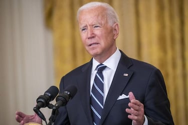 Why might vaccinated Americans need a booster shot?