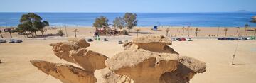 A continuación de Mazarrón se encuentra la pedanía de Bolnuevo, que dispone de por sí de una magnífica playa presidida por el característico monumento geológico de la Ciudad Encantada (gredas amarillas erosionadas). Pero desde aquí, también se pueden acceder a diversas calas que conforman una porción de litoral virgen y montañoso. Destacan las calas  de Rincón, Cueva de Lobos y Piedra Mala.