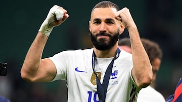 Soccer Football - Nations League - Final - Spain v France - San Siro, Milan, Italy - October 10, 2021 France's Karim Benzema celebrates after winning the Nations League REUTERS/Alberto Lingria