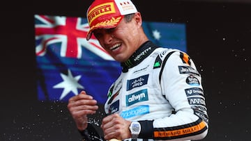Formula One F1 - Monaco Grand Prix - Circuit de Monaco, Monaco - May 25, 2025 McLaren's Lando Norris celebrates on the podium after winning the Monaco Grand Prix REUTERS/Piroschka Van De Wouw