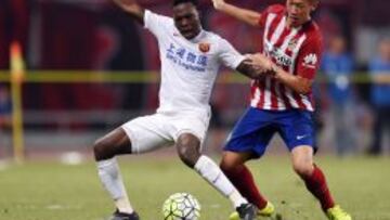 El chino Xu Xin ante Kouassi.