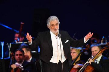 (FILES) In this file photo taken on August 28, 2019 Spanish tenor Placido Domingo performs during his concert in the newly inaugurated sports and culture centre 'St Gellert Forum' in Szeged, southern Hungary