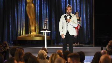 Marc Pilcher accepts the award for outstanding period and/or character hairstyling for the "Art of the Swoon" episode of "Bridgerton" during night one of the Television Academy's 2021 Creative Arts Emmy Awards at the L.A. LIVE Eve