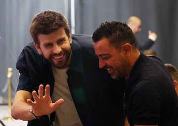 Gerard Piqué y Xavi Hernández.