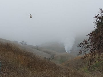 Firefighters at the Calabasas accident site.