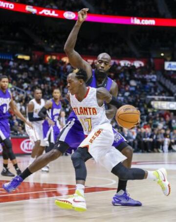 Dennis Schroeder y Quincy Acy.