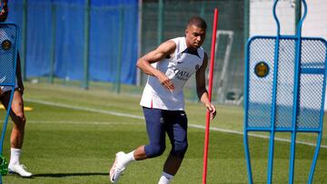 PARIS, FRANCE - JULY 11: Kylian Mbappe runs with the ball during a  PSG training session at PSG Training Center on July 11, 2022 in Paris, France. (Photo by Paris Saint-Germain Football/PSG via Getty Images)