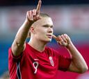 Fifteen men's footballers who play for a country they weren't born in