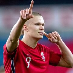 Fifteen men's footballers who play for a country they weren't born in