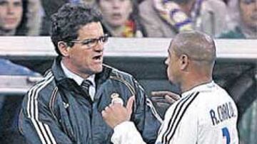 Roberto Carlos junto a Capello.