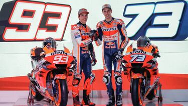Repsol Honda's Marc Marquez shakes hands with Alex Marquez as they pose for photographers during a launching ceremony in Jakarta, Indonesia, February 4, 2020. REUTERS/Willy Kurniawan