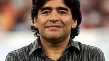 <B>CORAZÓN.</B> Maradona asegura que ha vuelta a Boca por su amor al club, no por un tema económico.