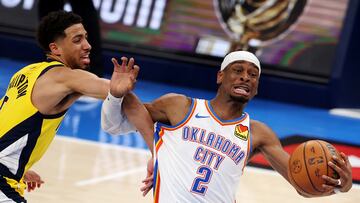 OKLAHOMA CITY, OKLAHOMA - JUNE 05: Shai Gilgeous-Alexander #2 of the Oklahoma City Thunder drives to the basket against Tyrese Haliburton #0 of the Indiana Pacers during the fourth quarter in Game One of the 2025 NBA Finals at Paycom Center on June 05, 2025 in Oklahoma City, Oklahoma. NOTE TO USER: User expressly acknowledges and agrees that, by downloading and or using this photograph, User is consenting to the terms and conditions of the Getty Images License Agreement. William Purnell/Getty Images/AFP (Photo by William Purnell / GETTY IMAGES NORTH AMERICA / Getty Images via AFP)