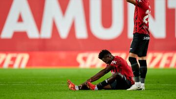 MALLORCA, SPAIN - NOVEMBER 09: Iddrisu Baba of RCD Mallorca lays injured over the ptich during the LaLiga Santander match between RCD Mallorca and Atletico de Madrid at Visit Mallorca Estadi on November 09, 2022 in Mallorca, Spain.  (Photo by Cristian Trujillo/Quality Sport Images/Getty Images)