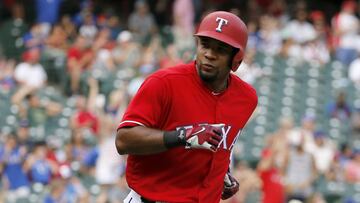 Texas Rangers' Elvis Andrus looks into his team dugout after as he runs the bases after hitting a two-run home run off of Los Angeles Angels' Keynan Middleton in the sixth inning of a baseball game, Sunday, Sept. 3, 2017, in Arlington, Texas. (AP Photo/Tony Gutierrez)