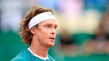 Russia's Andrey Rublev reacts as he plays against Australia's Alexei Popyrin during their Monte Carlo ATP Masters Series Tournament round of 32 tennis match on the Rainier III court at the Monte Carlo Country Club on April 10, 2024. (Photo by Valery HACHE / AFP)