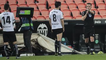 referee of match Xavier Estrada Fernandez during Spanish La Liga match between Valencia cf and Villarreal FC at Mestalla stadium. In Valencia on March 5, 2021.