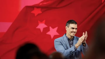 Spain's acting Prime Minister Pedro Sanchez applauds before delivering his speech on stage during the meeting of the Party of European Socialists, after Spain's socialists reached a deal with the Catalan separatist Junts party for government support, a pact which involves amnesties for people involved with Catalonia's failed 2017 independence bid, in Malaga, Spain, November 11, 2023. REUTERS/Jon Nazca