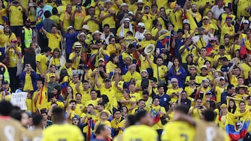 Ecuador supporters celebrate after their team won the Qatar 2022 World Cup Group A football match against Qatar at the Al-Bayt Stadium in Al Khor, north of Doha on November 20, 2022. (Photo by KARIM JAAFAR / AFP)