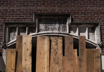 MINNEAPOLIS, MN - MAY 30: A view outside a boarded up Holy Trinity Lutheran Church on May 30, 2020 in Minneapolis, Minnesota. Buildings and businesses around the Twin Cities have been looted and destroyed in the fallout after the death of George Floyd while in police custody. Police Officer Derek Chauvin has been charged with third-degree murder and manslaughter in Floyd's death. Stephen Maturen/Getty Images/AFP == FOR NEWSPAPERS, INTERNET, TELCOS & TELEVISION USE ONLY ==