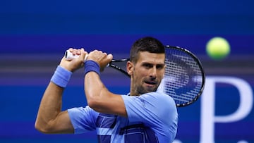 Serbia's Novak Djokovic returns the ball to Moldova's Radu Albot during their men's singles first round tennis match on day one of the US Open tennis tournament at the USTA Billie Jean King National Tennis Center in New York City, on August 26, 2024. (Photo by Kena Betancur / AFP)