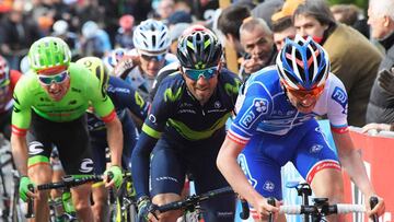 Spain&#039;s Alejandro Valverde (C) of the Movistar team, rides during the Fleche Wallonne cycling race on April 19, 2017 going from Binche to Mur de Huy.  / AFP PHOTO / POOL / Bernard Papon