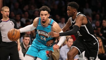 Mar 4, 2020; Brooklyn, New York, USA; Memphis Grizzlies shooting guard Dillon Brooks (24) drives to the basket against Brooklyn Nets shooting guard Caris LeVert (22) during the third quarter at Barclays Center. Mandatory Credit: Brad Penner-USA TODAY Spor